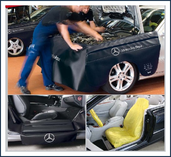 Datex covers on a Mercedes-Benz in a workshop, including fender, door, and seat covers